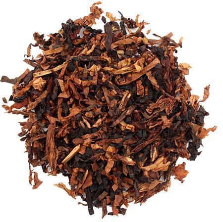 Peter Stokkebye Nougat Pipe Tobacco in a tin, showing golden-brown shredded tobacco with a smooth, rich texture.
