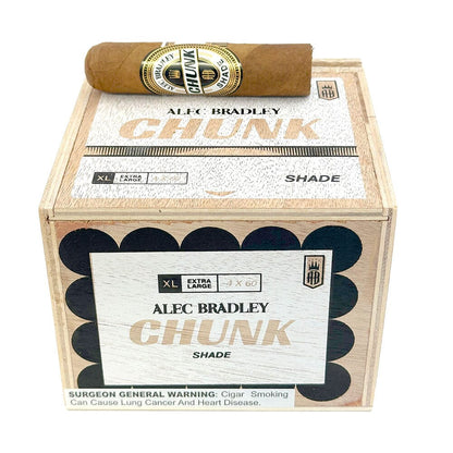 A box of Alec Bradley Chunk Shade premium cigars with open lid revealing wrapped cigars inside.