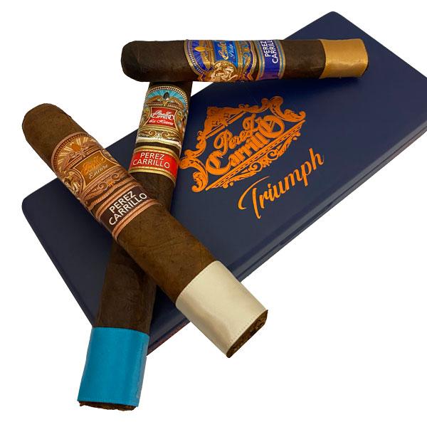 Assorted Perez Carrillo Trilogy premium cigars from E.P. Carrillo displayed in a sampler box.