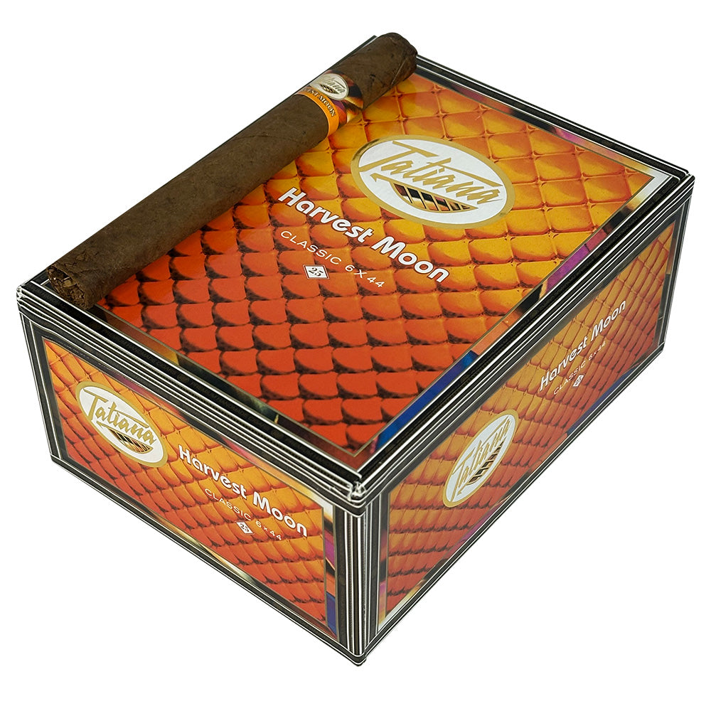 Tatiana Classic Harvest Moon flavored premium cigars with dark brown wrapper and decorative band, displayed in a close-up shot.