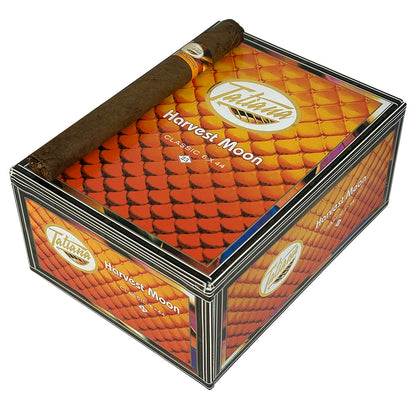 Tatiana Classic Harvest Moon flavored premium cigars with dark brown wrapper and decorative band, displayed in a close-up shot.