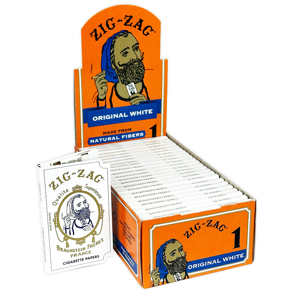 Open box of Zig Zag Original White rolling papers, Zig Zag RYO supplies for rolling cigarettes or joints.
