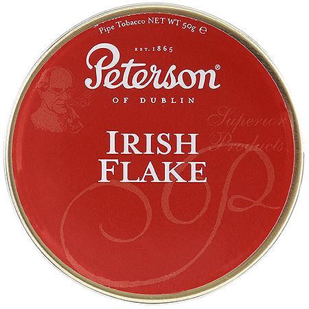 Peterson Irish Flake Pipe Tobacco in a resealable pouch, showcasing rich tobacco leaves and brand labeling.