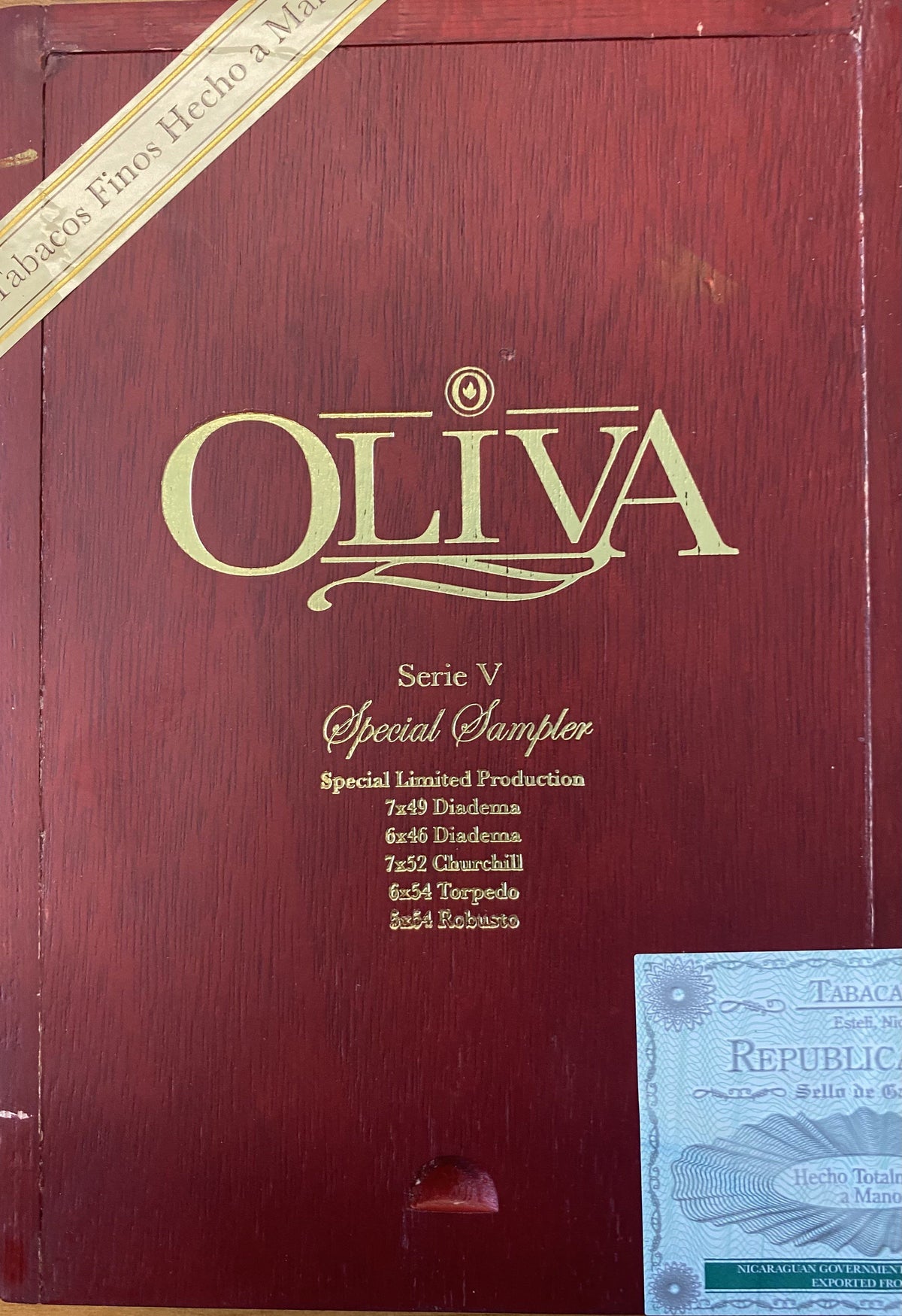 Oliva Serie V premium cigar with dark wrapper and detailed band, showcasing the high-quality craftsmanship of the Oliva brand.