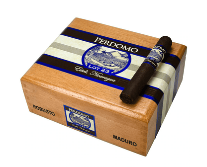 Close-up of a Perdomo Lot 23 Maduro premium cigar with dark, oily wrapper and band, showcasing the high-quality craftsmanship.
